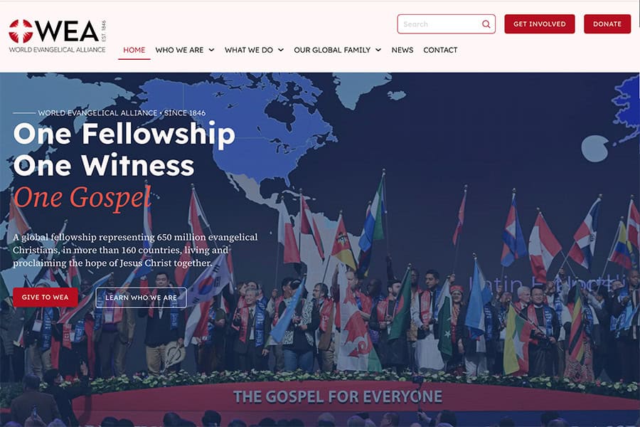 World Evangelical Alliance homepage with global flags and tagline