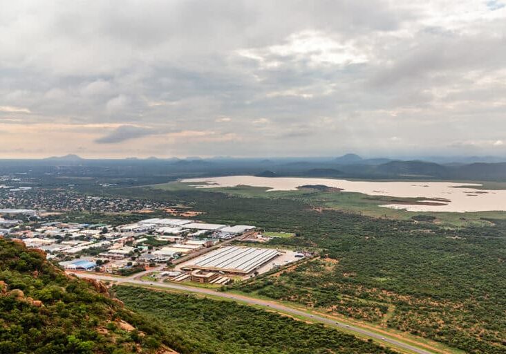 Aerial view of rapidly sprawling Gaborone city spread out over the savannah, Gaborone, Botswana, Africa, 2017